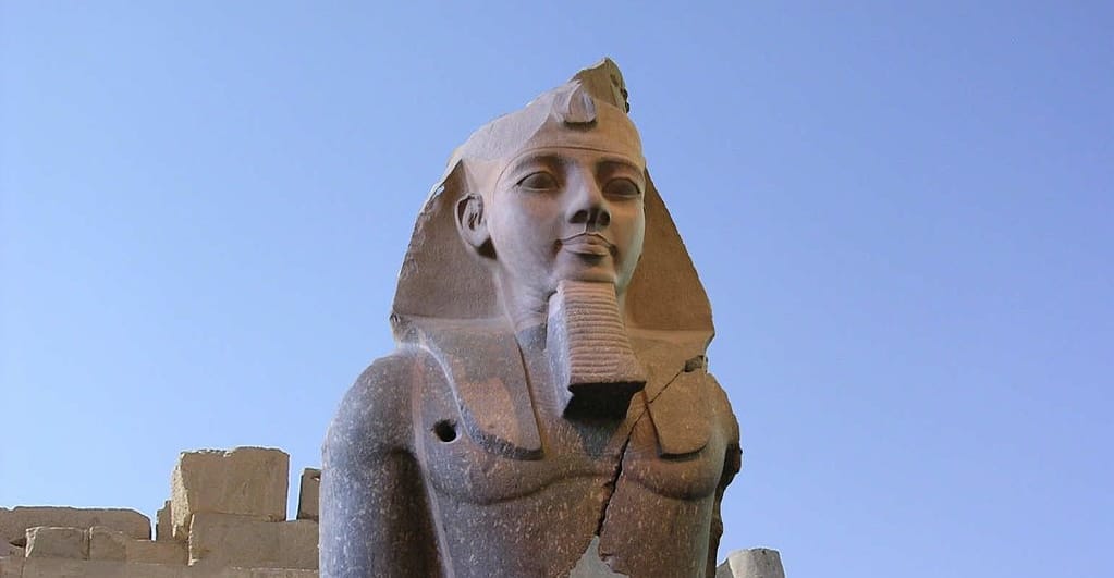 The Colossus of Ramesses II. It's huge Egyptian statue with some damage from the years. Ignore that! It's big, it's stone, and it's STILL HERE.