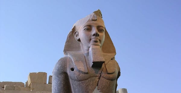 The Colossus of Ramesses II. It's huge Egyptian statue with some damage from the years. Ignore that! It's big, it's stone, and it's STILL HERE.